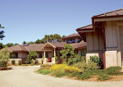 A driveway in front of a house.